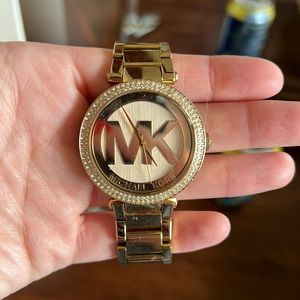 Michael Kors women’s gold watch. In great condition. Only worn a few times.